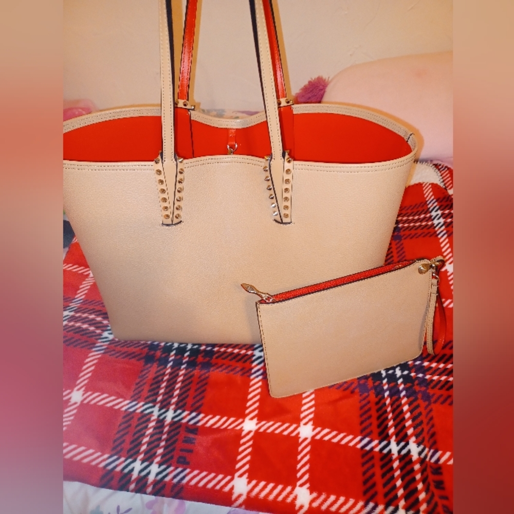 Red bottom purse.Christian Louboutin Leather Cabata Tote
